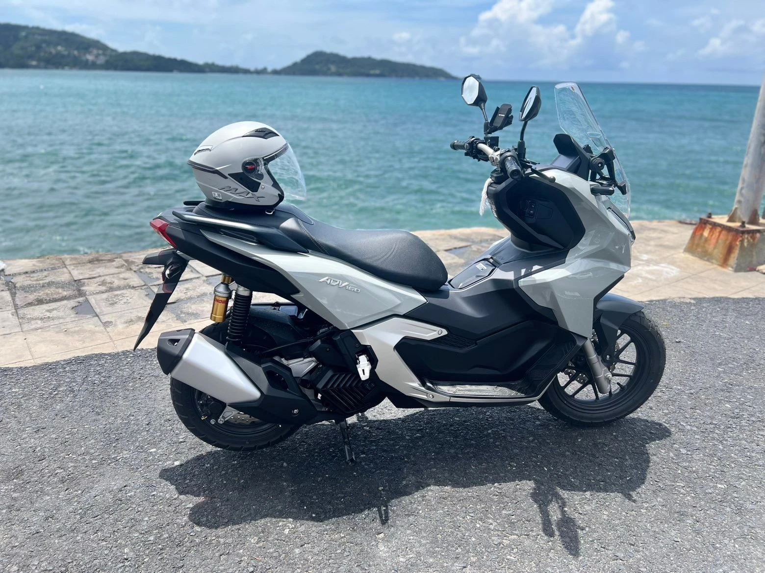 Honda scooter beside the sea